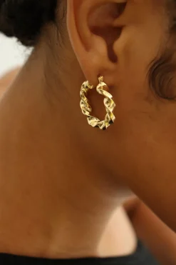 Dipua Argola Bruli em Ouro - Design Intrigante com um Toque de Modernidade